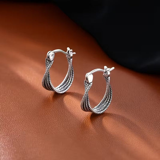 Twisted Silhouette Elegance Hoops