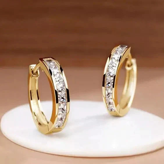 1+1 Offer: Elegant Gold and Crystal Earrings + Elegant bracelet with zirconias in gold